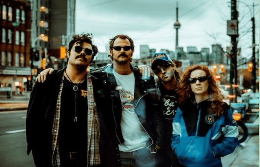 Toronto Psych-Punk Band Wine Lips Channels Modern-Day Frustration on New Album ‘TV Dinner’ Toronto Psych-Punk Band Wine Lips Channels Modern-Day Frustration on New Album ‘TV Dinner’